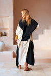 Back view of the kaftan showing its relaxed, flowing silhouette and natural drape.