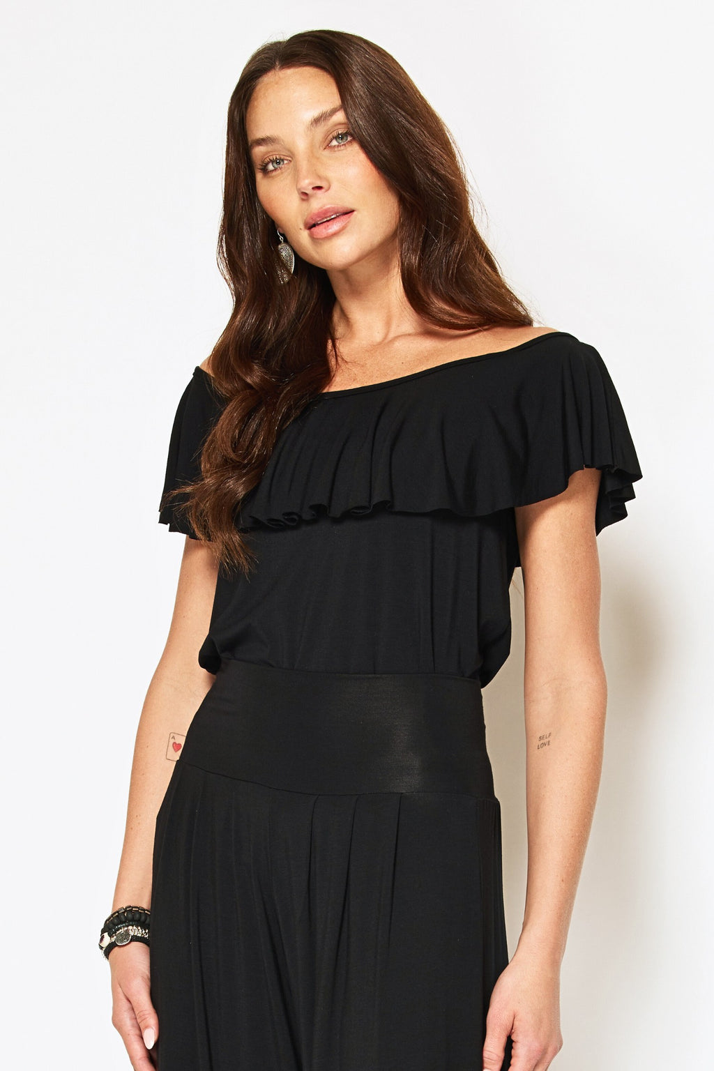Black off-the-shoulder frilled top made from natural sustainable modal, Australian made eco-friendly women's clothing