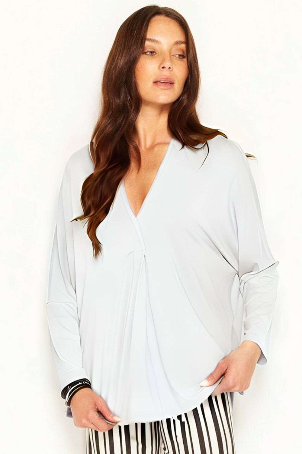 Amora Top in White made from natural, sustainable modal. Australian made. Oversized top with v neck and long sleeves.