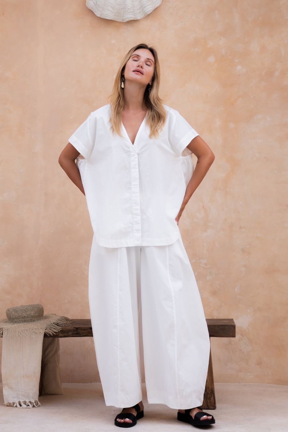 White cotton poplin oversized button-up top.