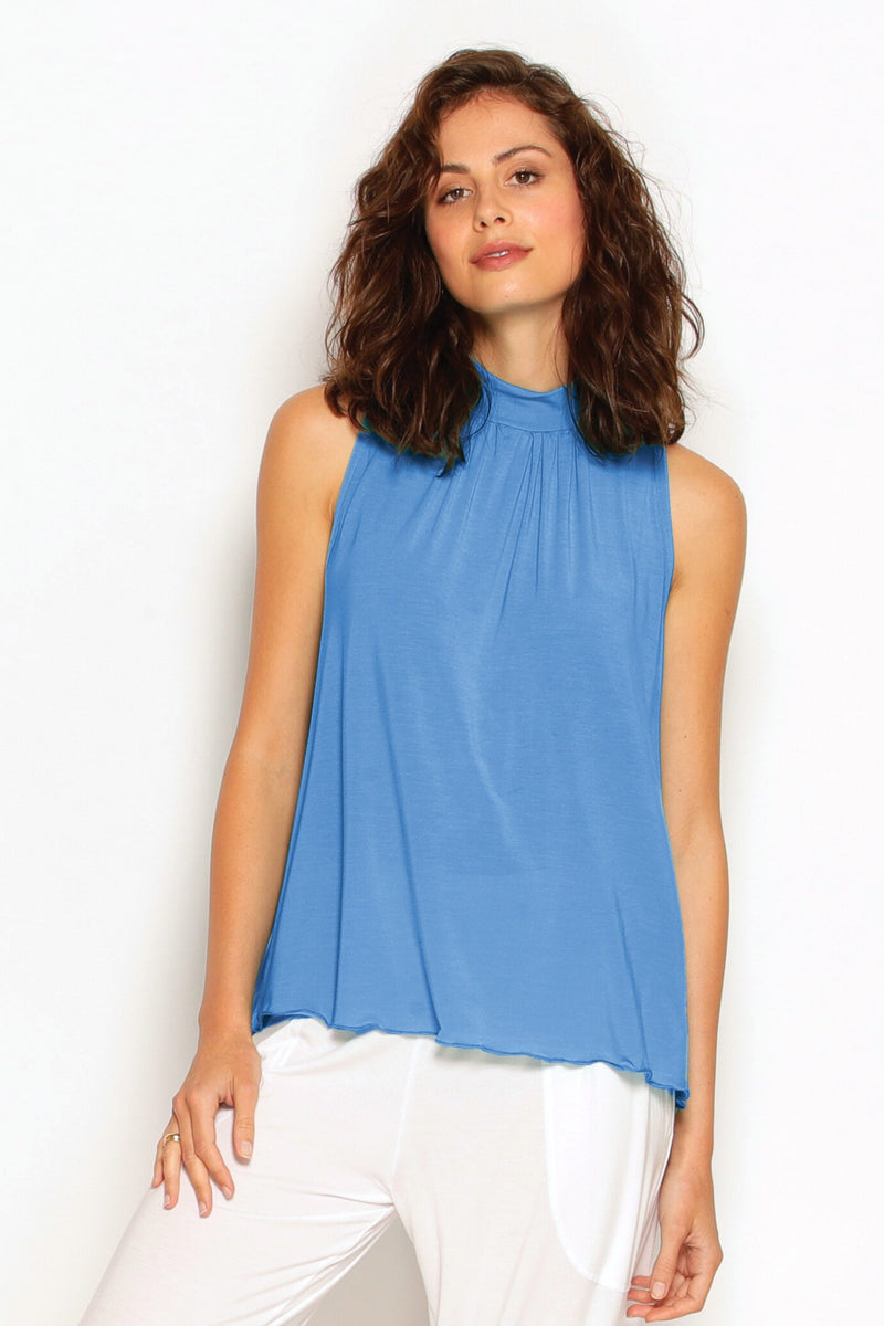 Blue sleeveless mock neck top with a flowing fit, made from natural sustainable modal, Australian made and eco-friendly