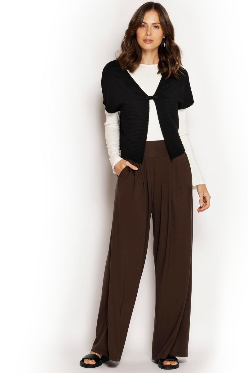 Rib Shrug styled over a singlet. Natural modal rib fabric with short sleeves, thicker weight and eco-friendly design.