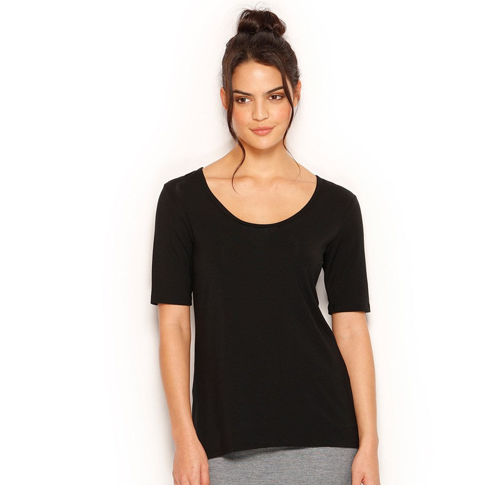 Essential Tee in Black with a smooth scoop neck, longer back hem and relaxed fit. Made in Australia from natural sustainable modal.