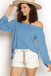 Ocean Blue Laluna Top styled off-shoulder. Lightweight, sustainable modal fabric, Australian made and versatile for layering.