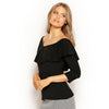 Side view of Misha Top in Black. Off-the-shoulder frill, cosy waist, soft sustainable modal, Australian made and lightweight.