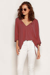 Cinnamon Peasant Top styled tucked into jeans. Soft, breathable modal, Australian made and eco-friendly for everyday wear.