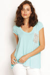 Short sleeve mist blue t-shirt with a sequin sparkle pocket. Scooped neckline. Made from soft, sustainable modal, Australian made and breathable.